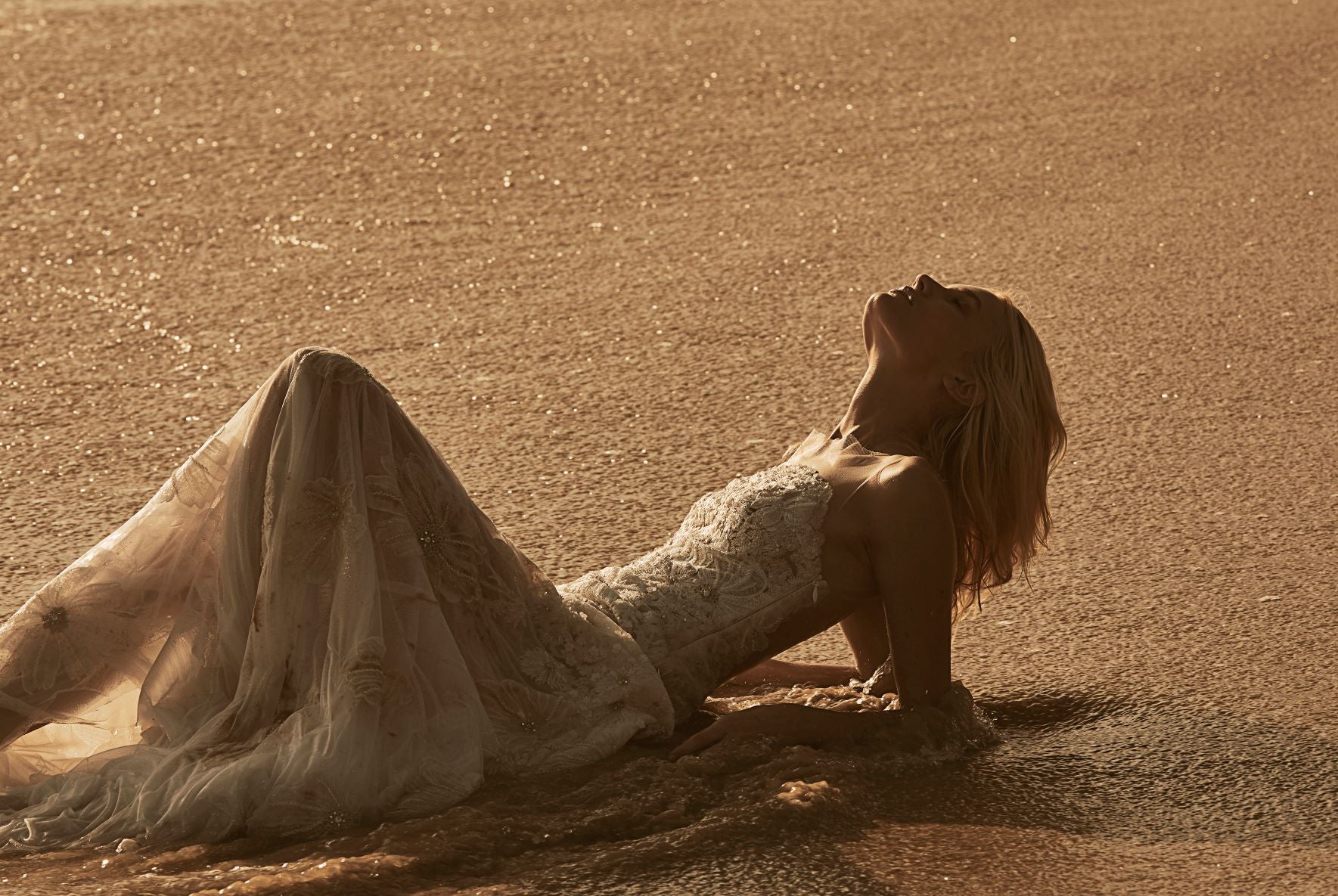 Bridal couture designer with stunning designer wedding dresses online, loved by brides worldwide from New York, California, Florida, Texas, Utah, United States, to Australia, Canada and New Zealand.