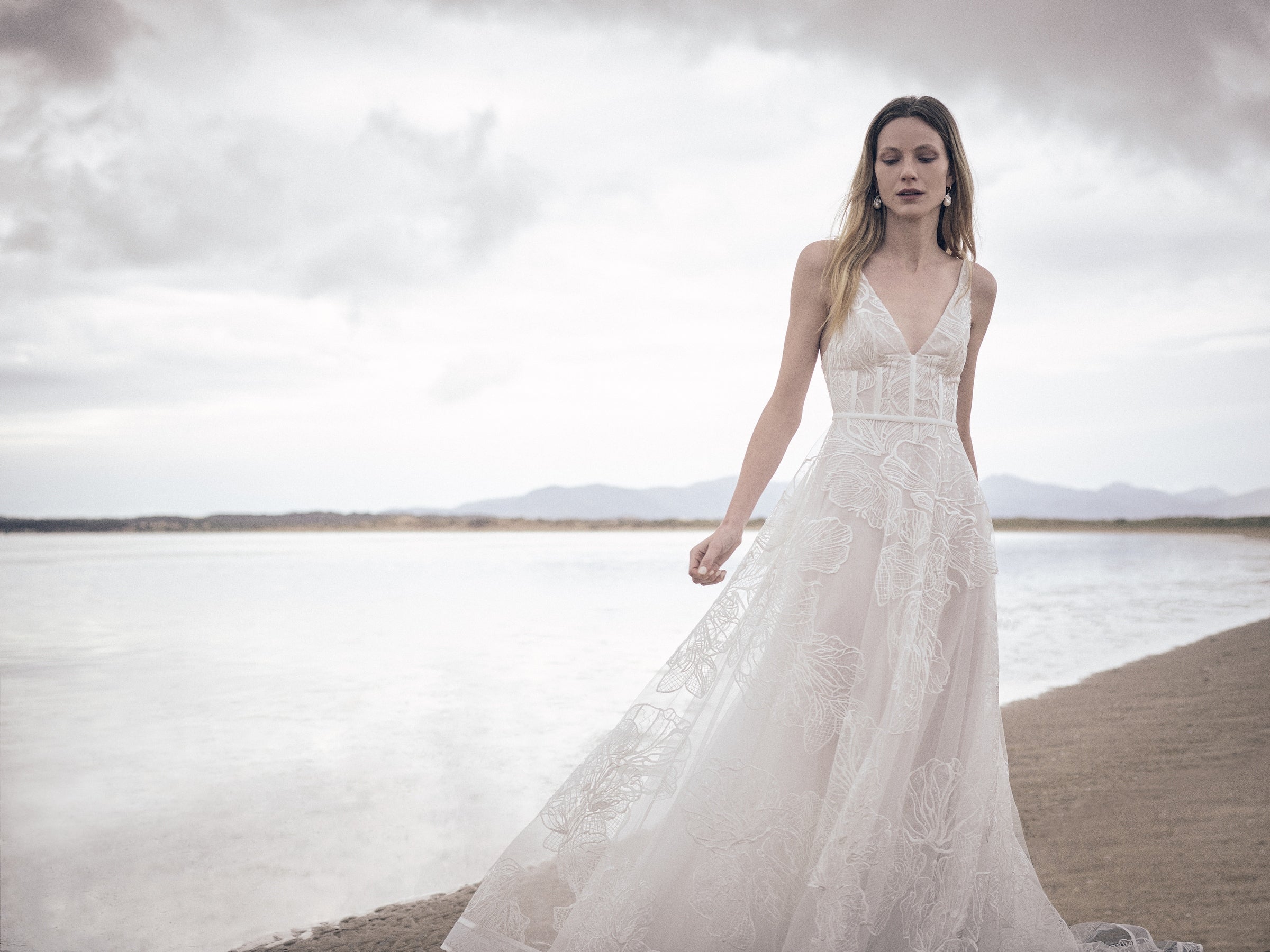 Bridal couture designer with stunning designer wedding dresses online, loved by brides worldwide from New York, California, Florida, Texas, Utah, United States, to Australia, Canada and New Zealand.